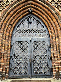 Impressive iron gate or door of a Polish christian church in Gdansk Poland