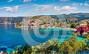 Impressive morning cityscape of Asos village on the west coast of the island of Cephalonia, Greece, Europe. Colorful summer sescap