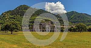 The impressive Roman amphitheater overlooked by Mount Ingino in the city of Gubbio, Italy