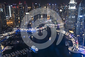 Impressive view of Dubai Marina by night from skyscraper