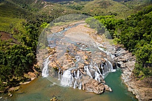 Impressive waterfalls on Koua river aerial view, between Poro and Kouaoua, North Province, New Caledonia, Melanesia, Oceania.