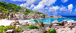 Impressive wild rocky beach Anse Marron in Seychelles. La Digue