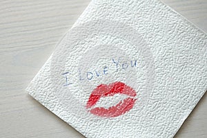 Imprint or A Trace from a Kiss, Red Lipstick on a White Napkin.