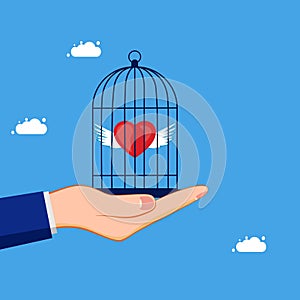 Imprison and control the heart. Lock the heart in the birdcage. business concept