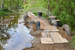 Impromptu pavement made in the countryside during a spring river flood photo
