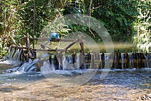 Improvised run-of-stream micro hydro electricity generation. , Laos