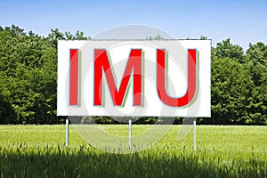 IMU which means Unique Municipal Tax the most unpopular italian tax on land and buildings - concept on advertising billboard photo