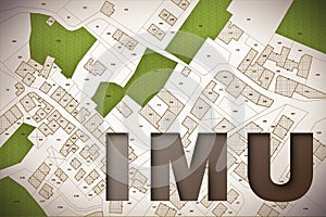 IMU which means Unique Municipal Tax the most unpopular italian tax on land and buildings - concept with cadastral map photo