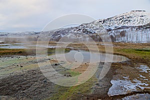 Inactive geyser in the geothermal area in Iceland