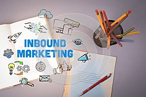 Inbound Marketing concept. Book and pencils photo