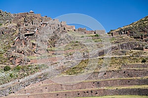 Inca agricultural terraces and village ruins in Pisaq, Peru