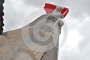 Inca Athaualpa with peruvian flag. photo