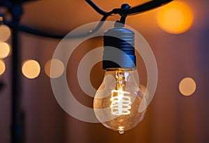 an inca inca inca inca inca light bulb hangs from a string