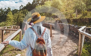 Tourist exploring at Archaelogical Qenqo. Strange and weird rock structures. Neighborhoods Cusco City.