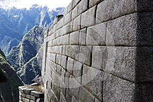 Inca Stone Wall With Mountains In Background Machu Picchu Peru