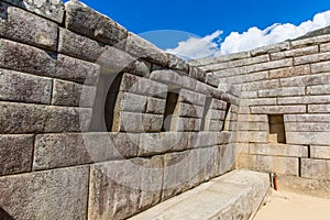 Inca Wall in Machu Picchu, Peru, South America. Example of polygonal masonry. The famous 32 angles stone