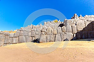 Inca Wall in SAQSAYWAMAN, Peru, South America. Example of polygonal masonry. The famous 32 angles stone photo