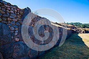 Inca Wall in SAQSAYWAMAN, Peru, South America. Example of polygonal masonry. The famous 32 angles stone photo