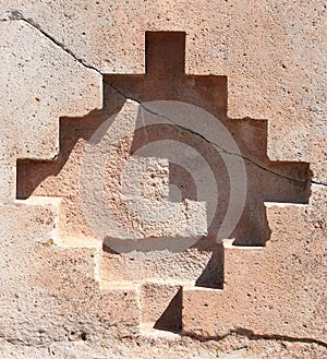 An Incan cross carved into stone