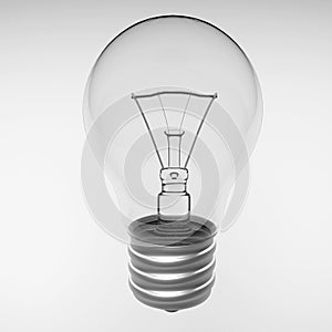 Incandescent light bulb with a clear glass bulb close-up