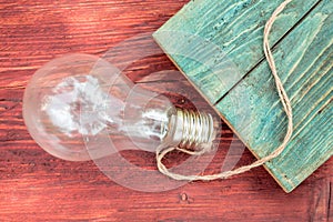 Incandescent light bulb with rope