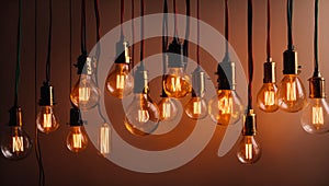 Incandescent light bulbs close up electric power glowing filament lightbulb illuminated