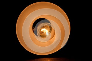 incandescent light globe bulb lamp, an electric light with a wire filament tungsten that is heated until it glows, consists of gas