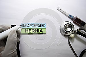 Incarcerated hernia text on top view  on white background. Healthcare/medical concept