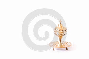 Incense burner with Hols isolated on white background photo