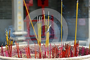 Incense burning stick outside temple in Hong Kong