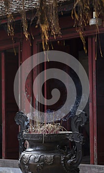 incense burning at the Temple of the Jade Mountain in Hanoi Vietnam