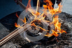 Incense burning at temple, Shanghai - China