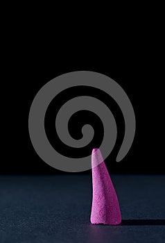 incense and smoke close-up on a black background