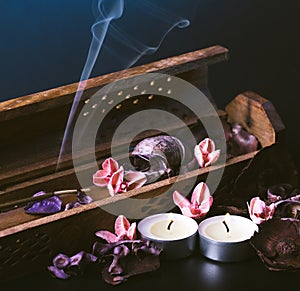 Incense stick aroma with smoke  in a wooden handmade holder