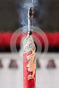 Incense stick with golden dragon, Buddhist temple