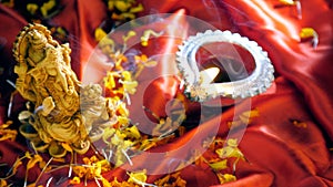 Incense stick placed near an idol of Lord Ganesha - Hindu rituals and prayer