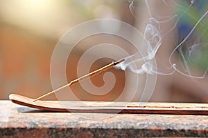 Incense stick and smoke from incense burning. Beautiful smoke. B