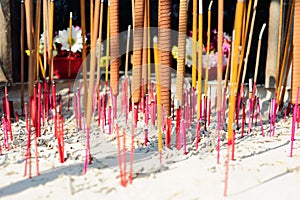 Incense sticks are burned for worship in Taoism photo