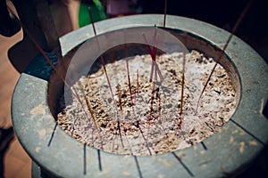 Incense Sticks Burning and Sending Smoke and Prayers up Ngoc Son Temple