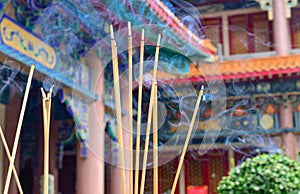 Incense sticks are burning with smoke use for pay