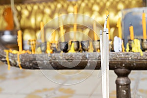 Incense sticks(joss sticks) burning in the temple fo religion concept