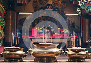 Incense sticks in the pot inside Guan Di Buddhist Temple. Kuan Ti Temple in Chinatown. Kuala Lumpur. Malaysia