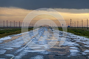 Inclement weather, hail, ice on the road photo