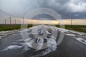 Inclement weather, hail, ice on the road photo