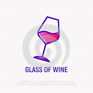 Inclined glass of wine thin line icon