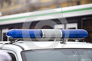 the included blue flashing light with a police car siren. flasher