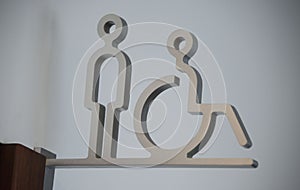 Inclusion sign from metal