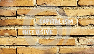 Inclusive capitalism symbol. Concept words Inclusive capitalism on beautiful brown brick wall. Beautiful brown brick wall