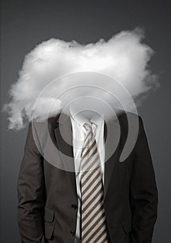 Incognito concept, faceless businessman with head in clouds