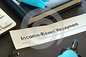 Income Based Repayment IBR documents on a desk. photo